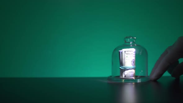 Save Money for Investment Concept. Under a Glass Cover alt
