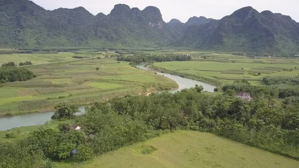 Upper View Blue River with Green Sandy Banks Near Fields alt