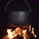 A Castiron Vat of Boiling Broth Hangs in a Woodburning Stove Over an Open Fire - VideoHive Item for Sale