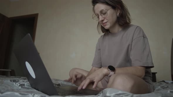 Freelancer Girl with Computer at Home