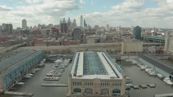 Ascending Aerial Drone Shot of Philadelphia Waterfront and Downtown Skyline