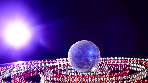 Shiny Blue Toy for Christmas or New Year and Beads, Rotation, on Black, Back Light alt