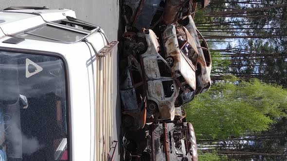 Vertical Video of Destroyed and Shot Cars in the City of Irpin Ukraine alt