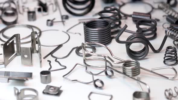 Different Shapes and Sizes of Metal Springs of Different Sizes