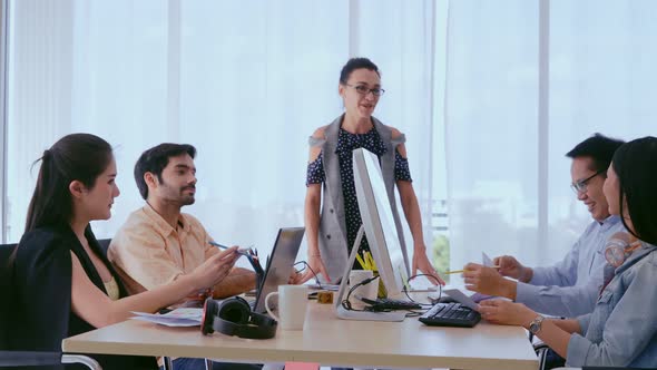 Senior Leader Giving Advice Speech to Team Members alt