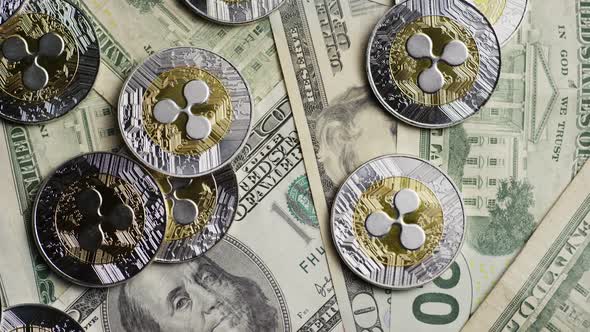 Rotating shot of Bitcoins (digital cryptocurrency) - BITCOIN RIPPLE  alt