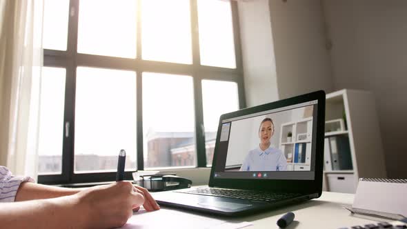 Woman with Laptop Having Video Call at Office alt