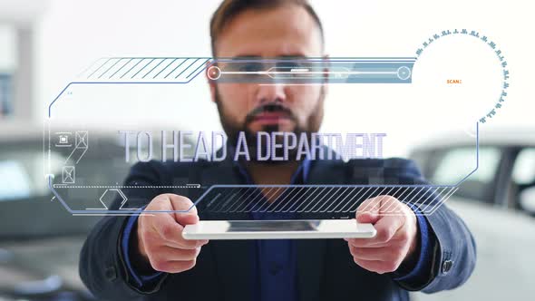 Businessman Holds a Tablet with HUD Futuristic Elements. Hologram with an Inscription - To Head a