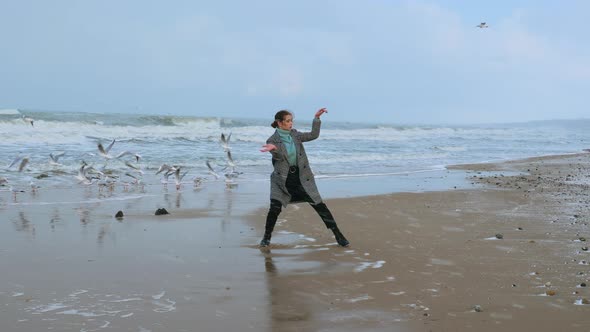 A Woman Performing Dance Improvisation at the Seacoast alt