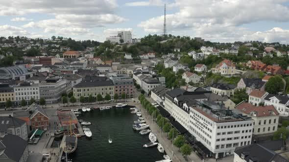 Boats At The Pollen Harbour In Arendal, Norway. - aerial drone alt