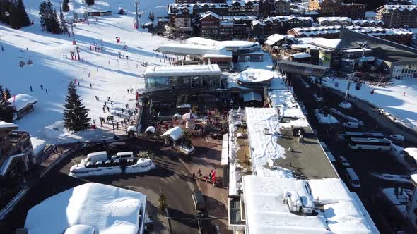 Majestic Winter Aerial Landscape and Ski Resort with Typical Alpine Wooden Houses in French Alps