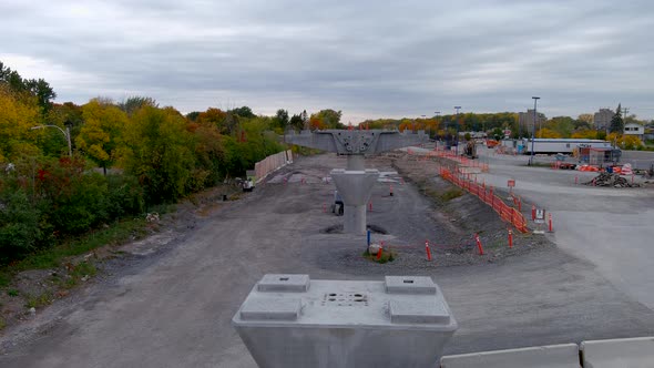 4K camera drone view of the construction site of the REM in Pierrefonds-Roxboro, Montreal.