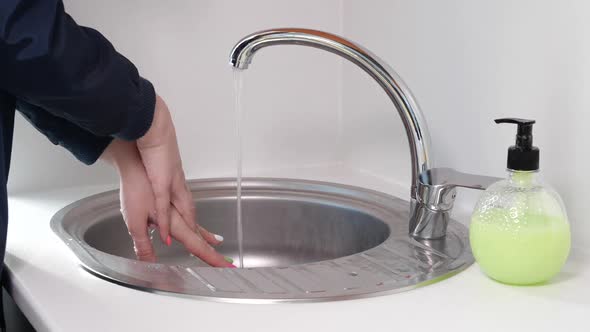The Girl Thoroughly Washes Her Hands To Avoid Getting Coronavirus, Covid-19