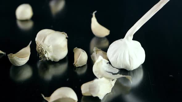Garlic Cloves Are Falling On The Table