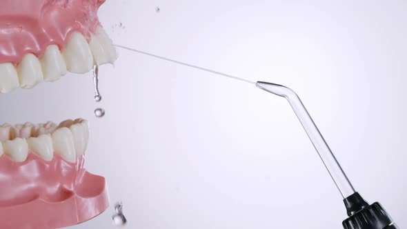 Water Flosser Cleaning Teeth at Distance alt