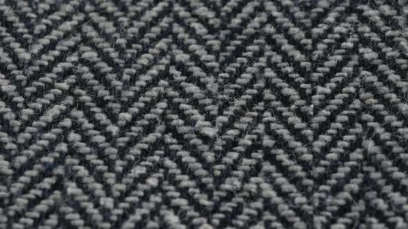 tweed textile background with herringbone pattern from a vintage cover
