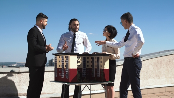 Group of Engineers and Architects in a Meeting alt