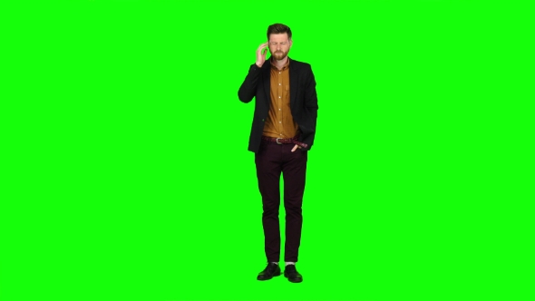 Man Is Suffering, His Head Hurts, He Is Tired. Green Screen alt