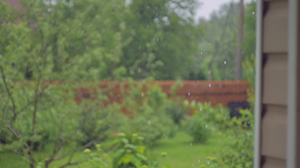 Heavy Rain on a Background of a Wall