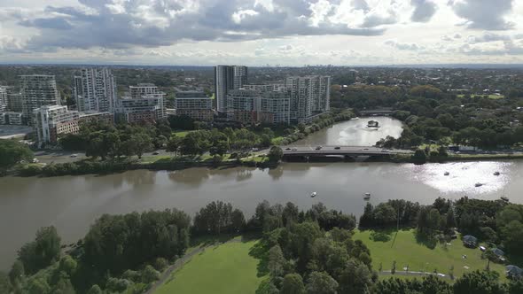 Busy Princess Highway in the suburb of Sydney, Wolli Creek. Australia. Aerial shot. Panning to the r alt