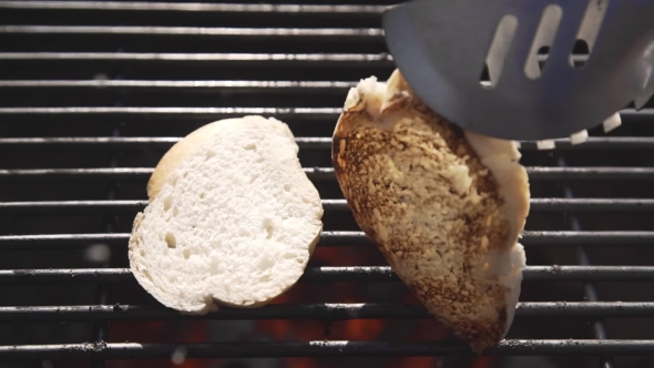 VideoHive Pieces of White Bread Are Grilling on the Open Fire Outside Grill and Barbecue Bbq at the 20314838 VideoHive Pieces of White Bread Are Grilling on the Open Fire Outside Grill and Barbecue Bbq at the 20314838