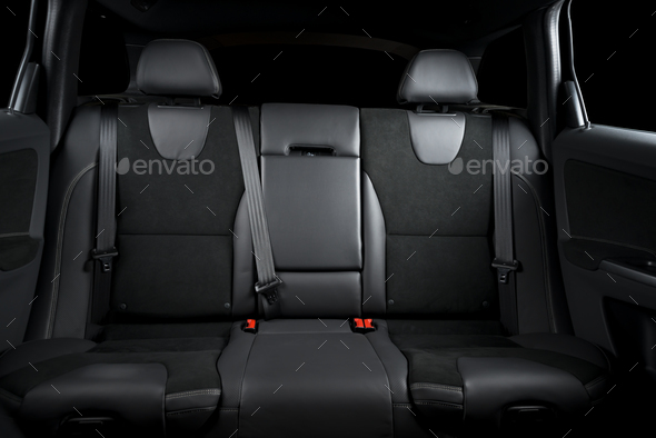 back seats of modern luxury car interior, black leather Stock Photo by  gargantiopa