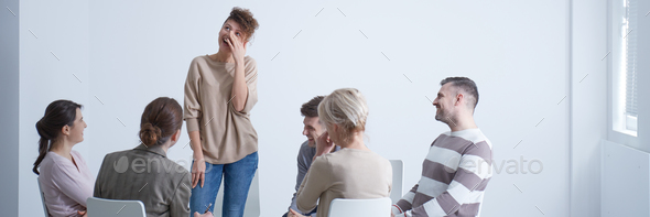 Woman crying during group therapy