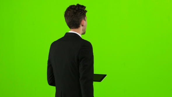 Businessman Is Going To Work and Prints Important Messages. Green Screen alt