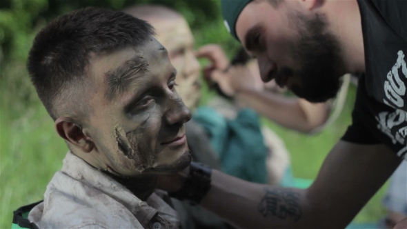 Makeup Masters Create Zombies in the Open Air.