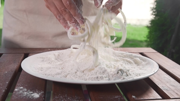 VideoHive Sliced Rings of the Onion Is Rolled in Flour Beforefrying in the Boling Oil Cooking Outside Fast 20320870 VideoHive Sliced Rings of the Onion Is Rolled in Flour Beforefrying in the Boling Oil Cooking Outside Fast 20320870