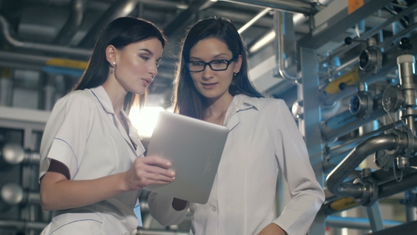 Engineers in Mechanical Factory Working alt