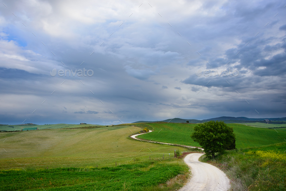 A winding road to an unknown destination - Stock Photo - Images