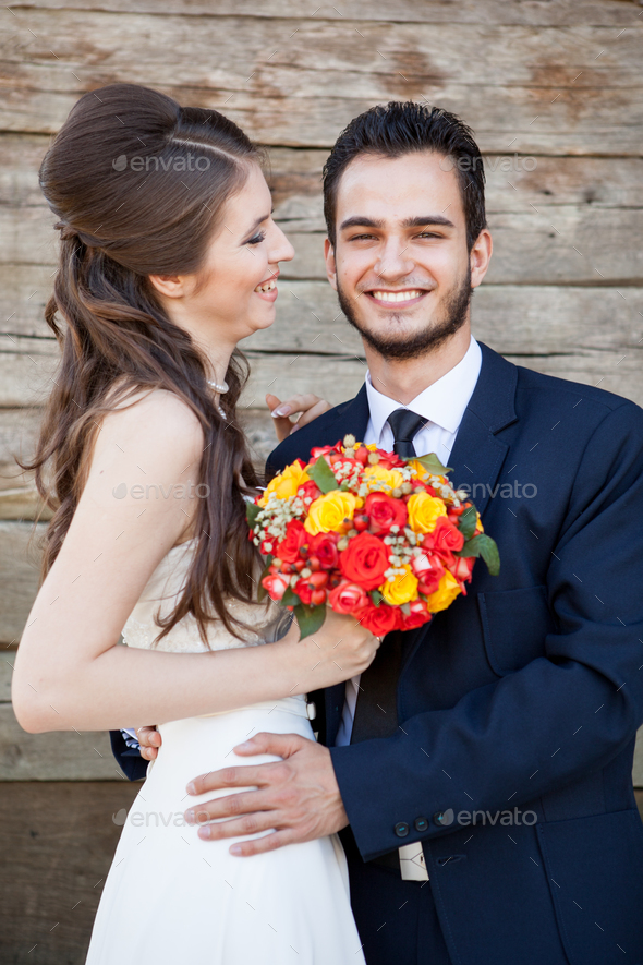 Portrait of Happy wife and groom in their wedding day