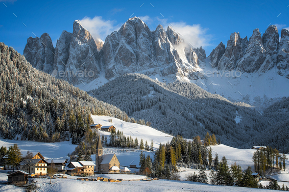 Small village in the snow in the Dolomites in winter Stock Photo by iPics
