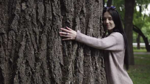 Woman Hugging Big Tree, Nature Protection Concept