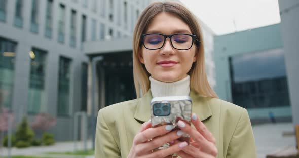 Business Woman withGlasses Use Phone Walking on Street Urban Technology Mobile alt