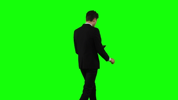 Businessman Is Going To Work and Prints Important Messages. Green Screen alt