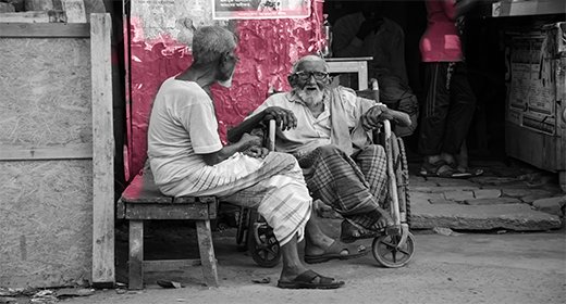 senior two man gossiping