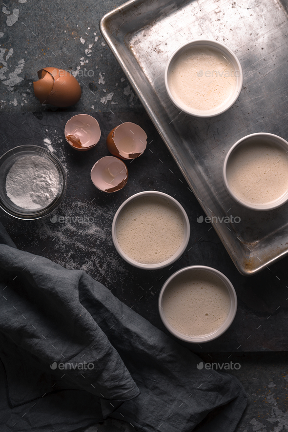 Creme brulee without the caramelized crust in the ramekins on the stone