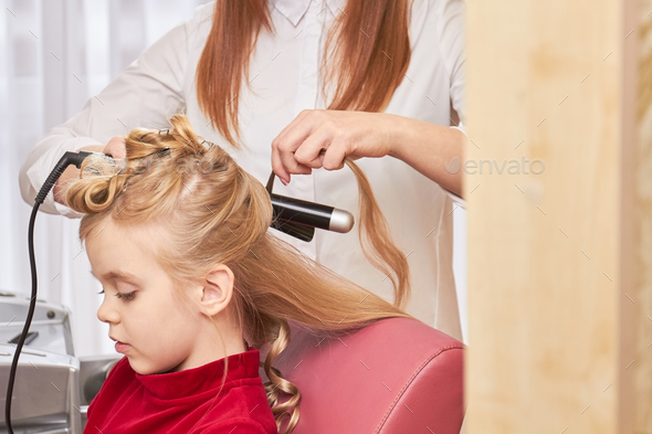 Child getting hair done