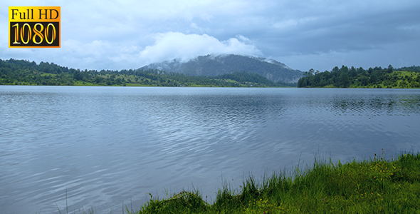 Lake With Cloudy Hill