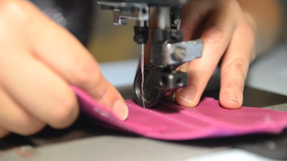 Shoemaker Repairing Shoes.  alt
