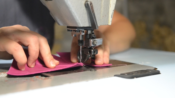 Shoemaker Repairing Shoes.  alt