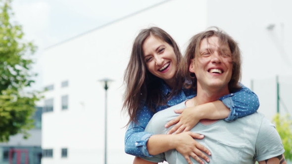 Happy Relationship Friendship Between a Man and a Woman. The Guy and the Girl Are Having a Good