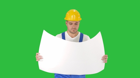 Professional engineer worker looking at blueprint on a alt