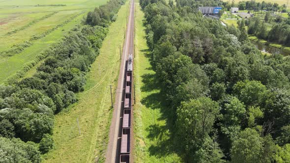 Cargo Train on the Rails. Following The Freight Train, Aerial
