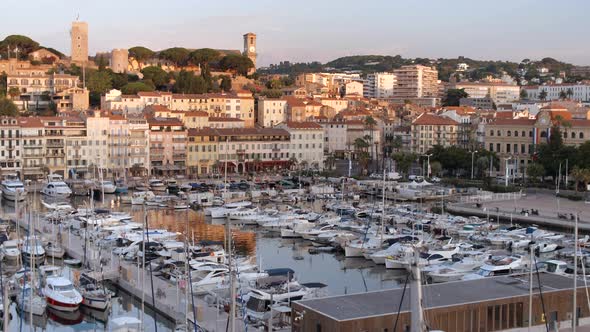 Sunrise in the Port of Cannes With Yachts and Ships Moored in the Marina alt