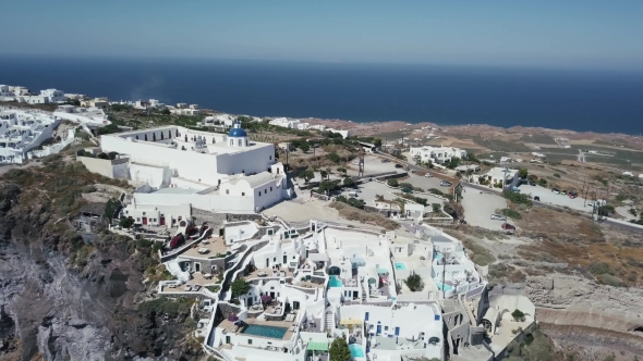Santorini Aerial View Video of Greek Island with White Houses and Blue Roofs on Sunset and in the alt