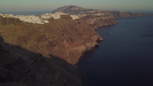 Santorini Aerial View Video of Greek Island with White Houses and Blue Roofs on Sunset and in the