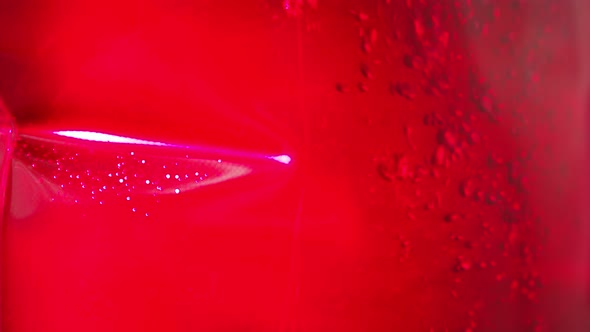 Plastic bags full of red liquid inside a pharmaceutical manufacturing clean room alt